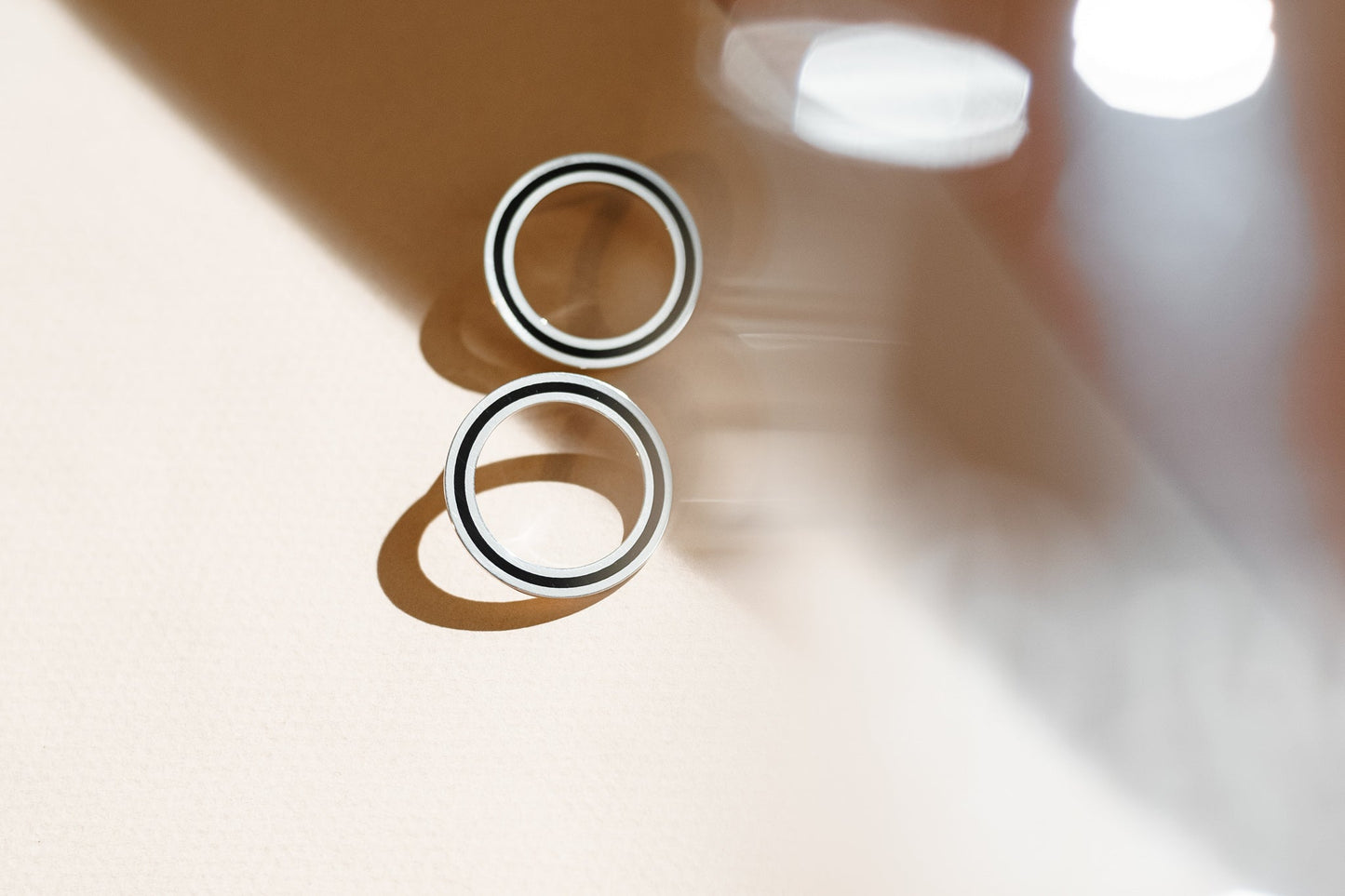 Earrings "Cyclicity" with black enamel
