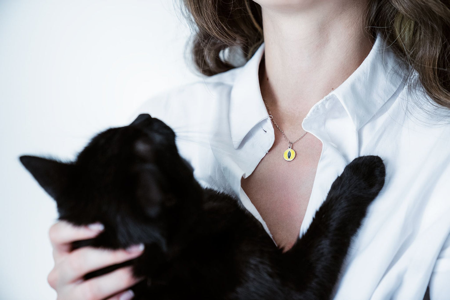 Pendant "Cat’s Eye" with enamel