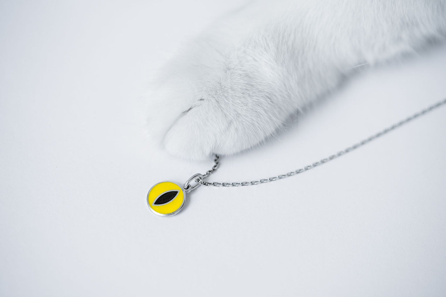 Pendant "Cat’s Eye" with enamel