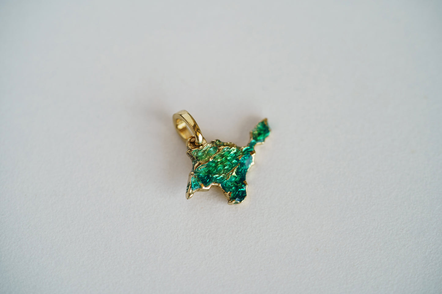 Pendant "Ukrainian Peninsula" textured with emerald enamel