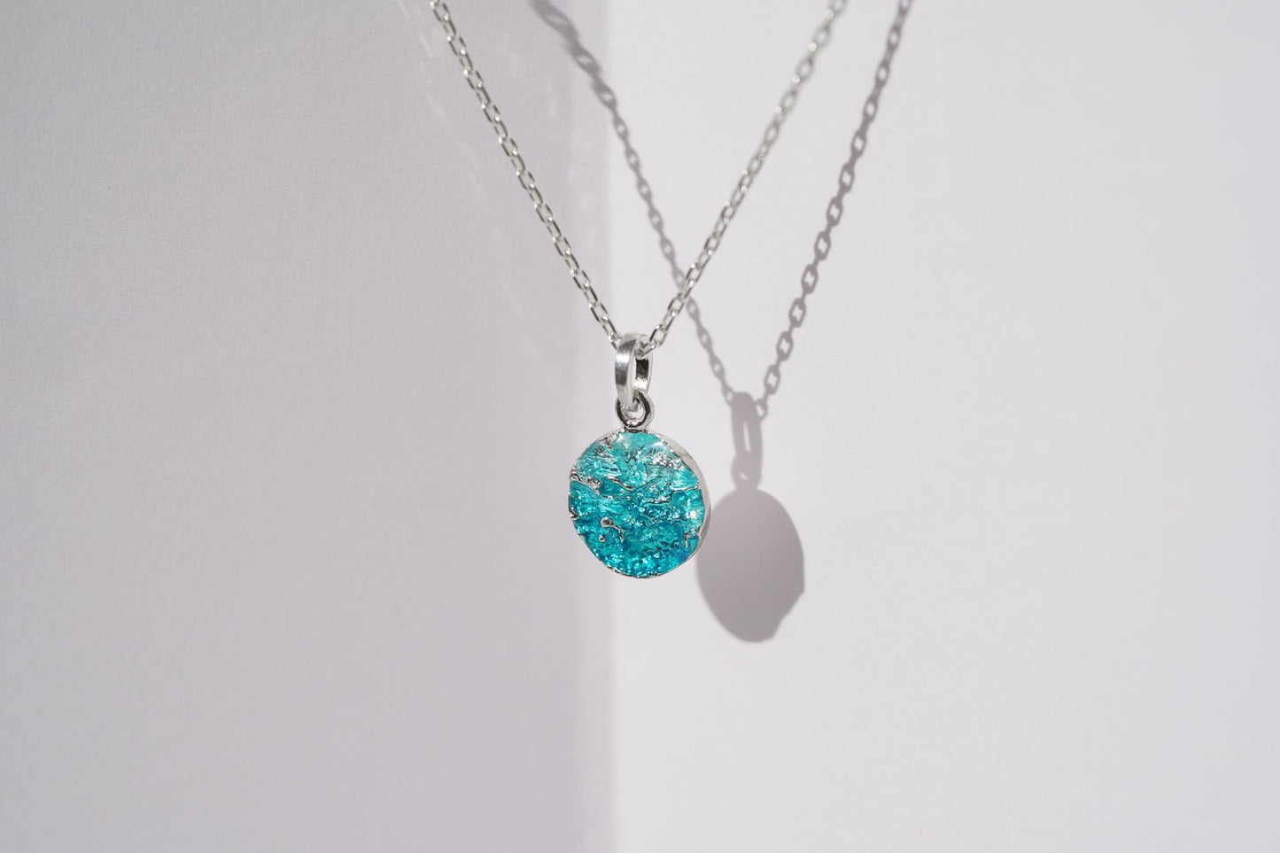 Pendant-disk "Wave" (10 mm) emerald