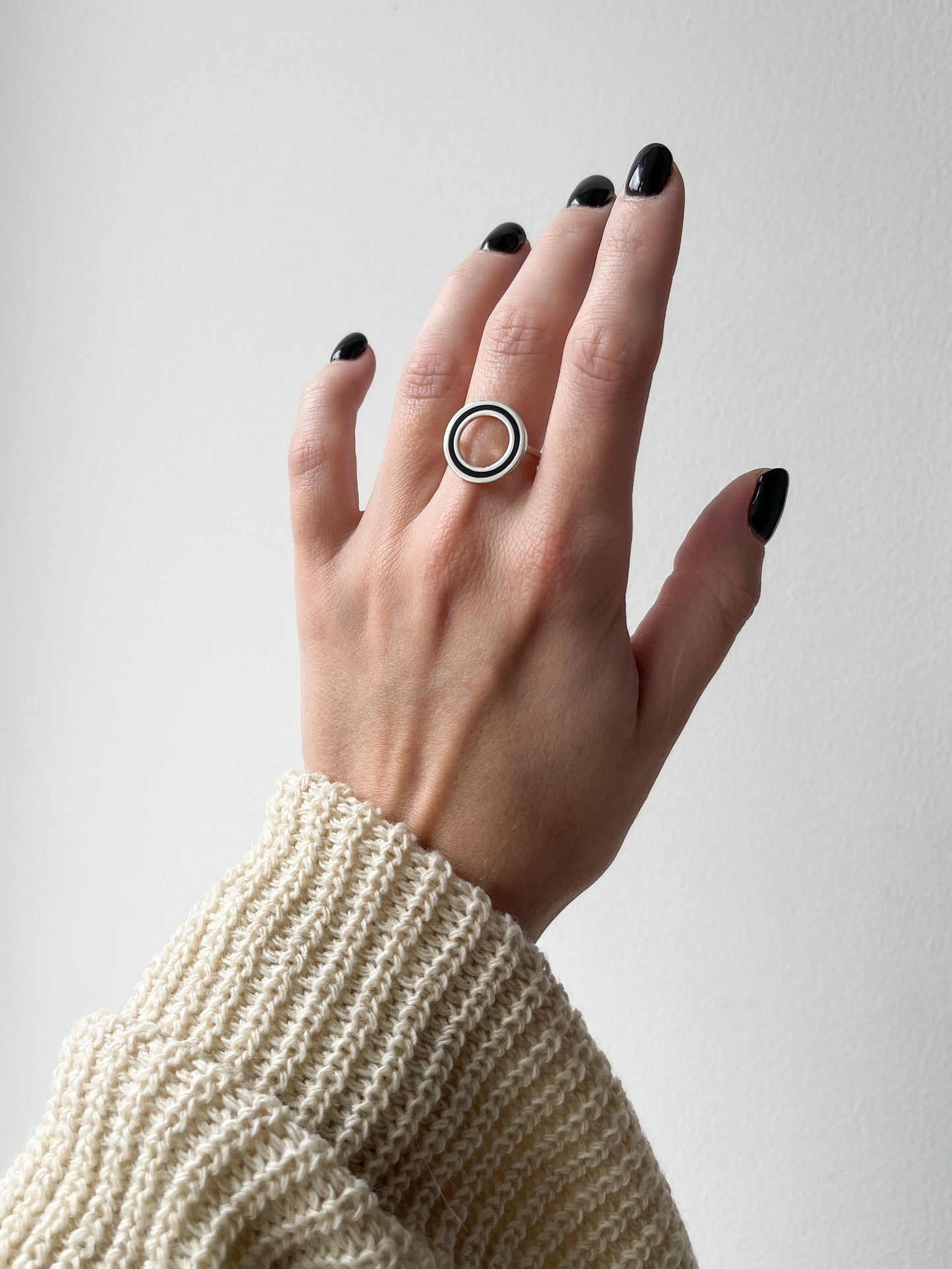 Ring "Cyclicity" with black enamel