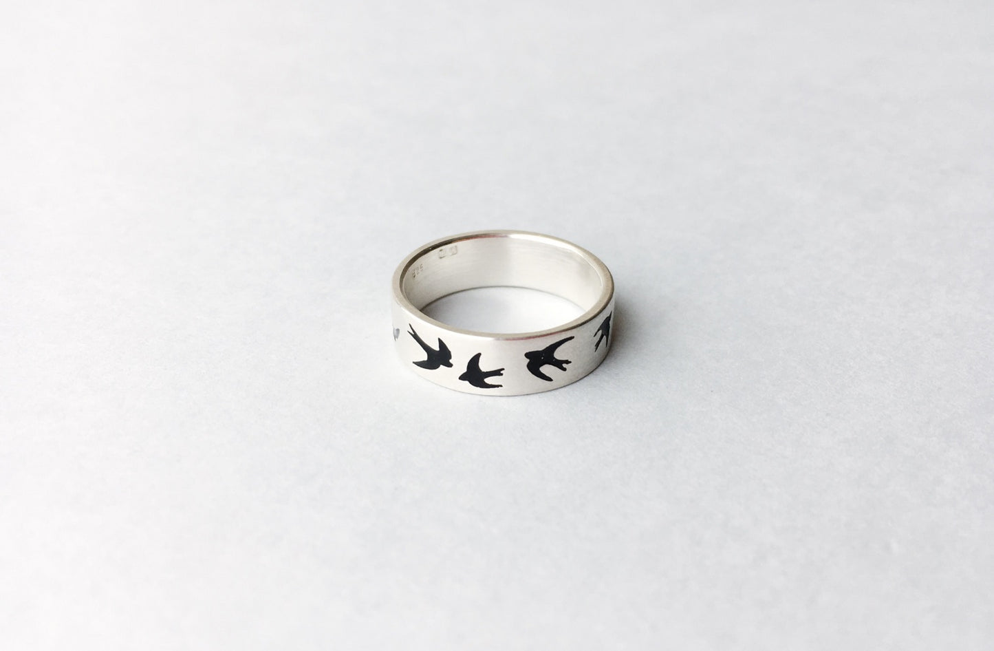 Ring "Swallows" with black enamel (5 mm)