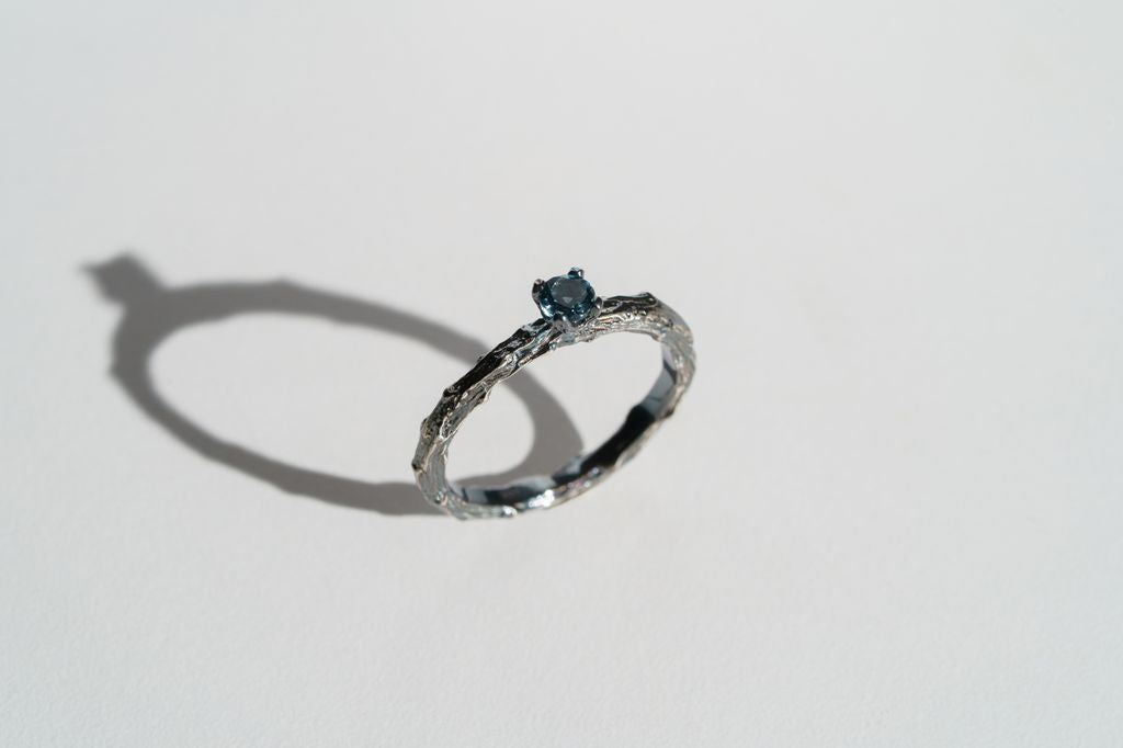Ring «Dark Vine» with a 3.5 mm London Blue Topaz