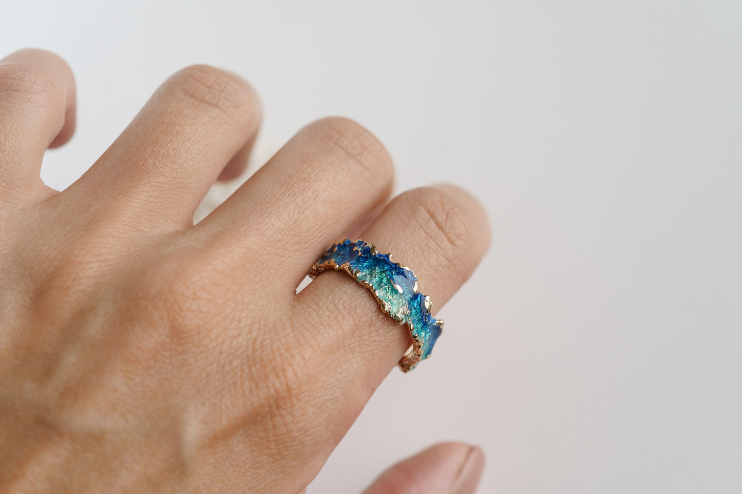 Ring "Wave" blue (6 mm) with gilding