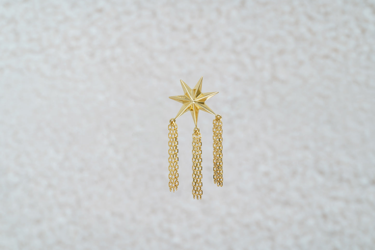 Mono earring "Guiding Star" with chains