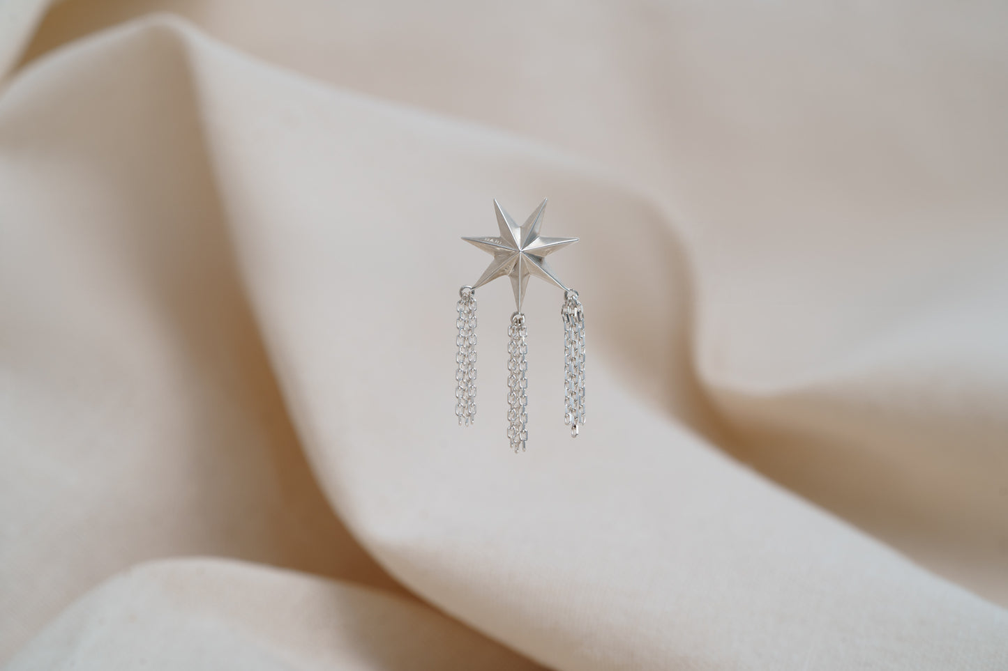 Mono earring "Guiding Star" with chains