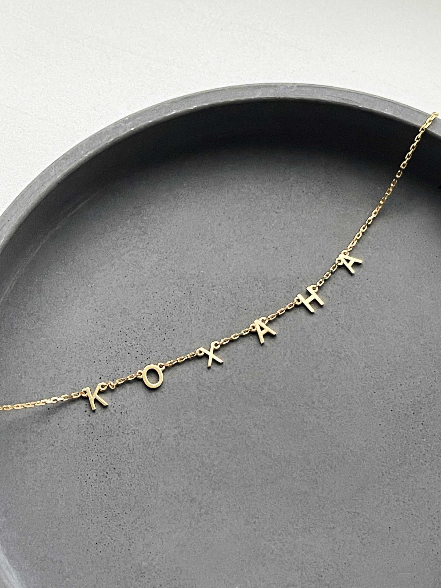 Necklace with a custom word