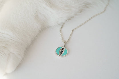 Pendant "Cat's Eye" (9 mm) with emerald enamel and black stones