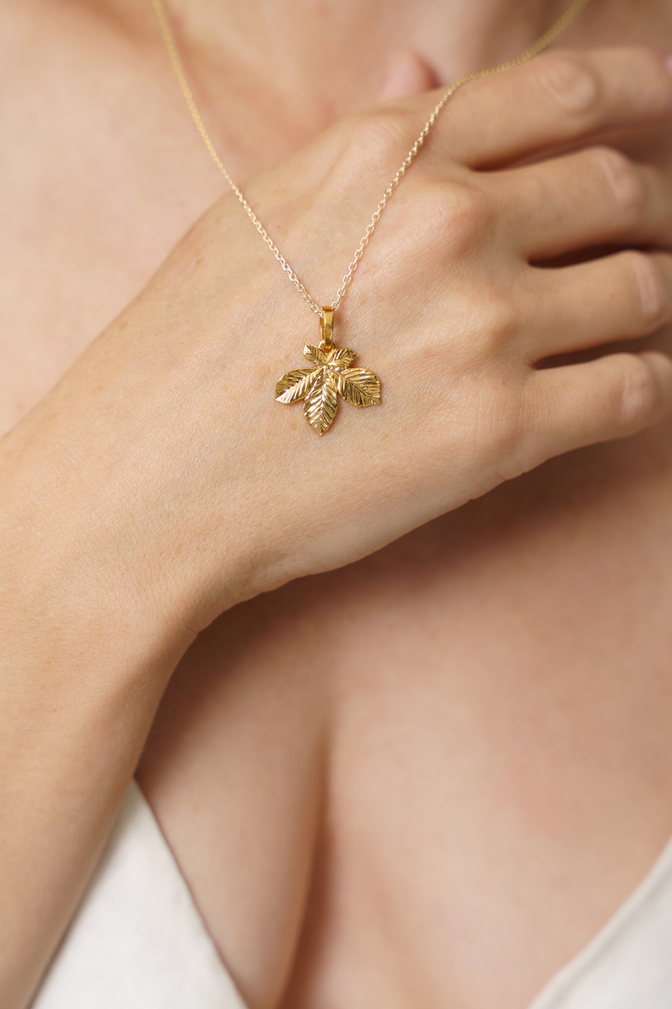 Pendant “Chestnut Leaf” (20 mm) with gilding