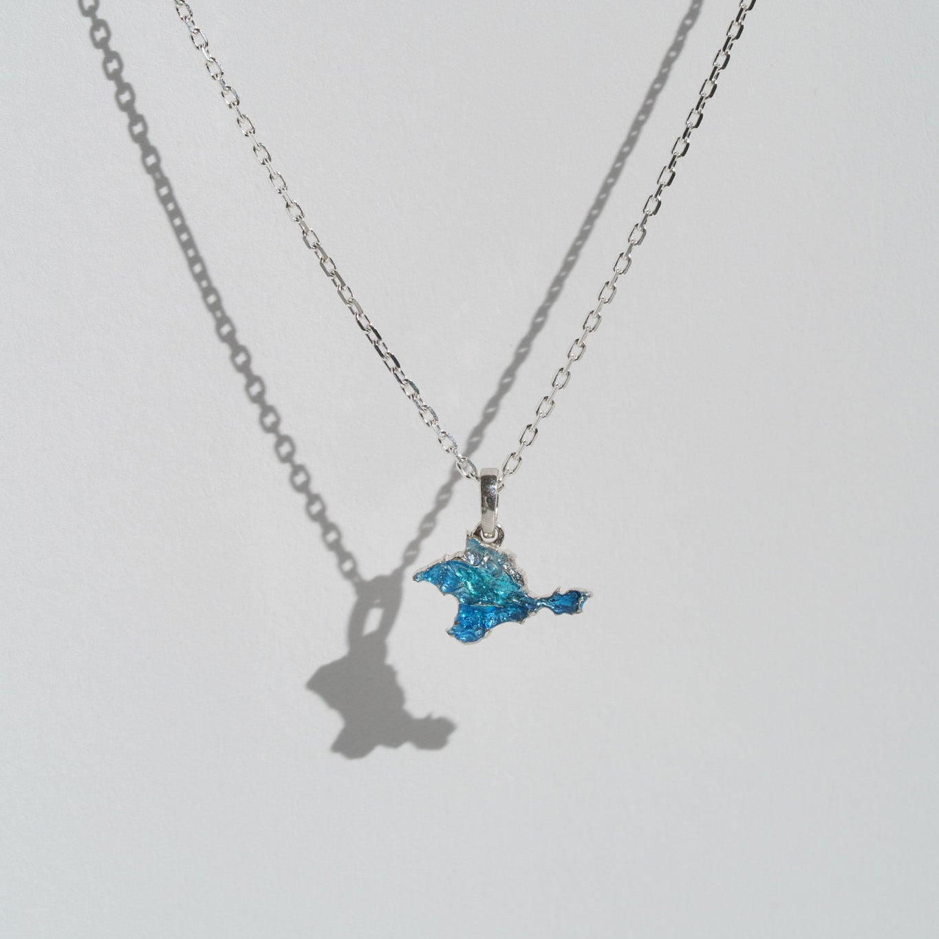 Pendant "Ukrainian Peninsula" textured with blue enamel