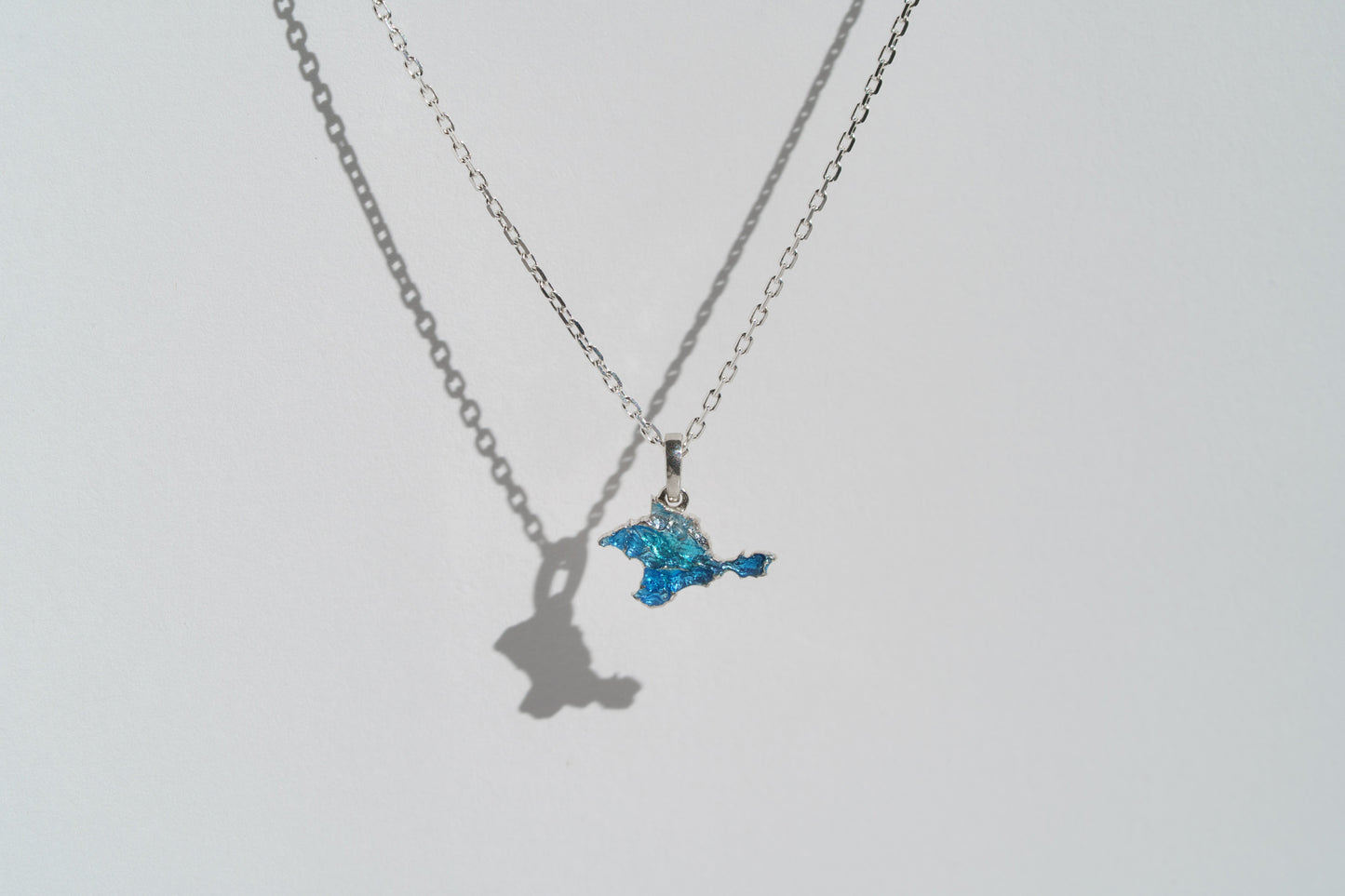 Pendant "Ukrainian Peninsula" textured with blue enamel