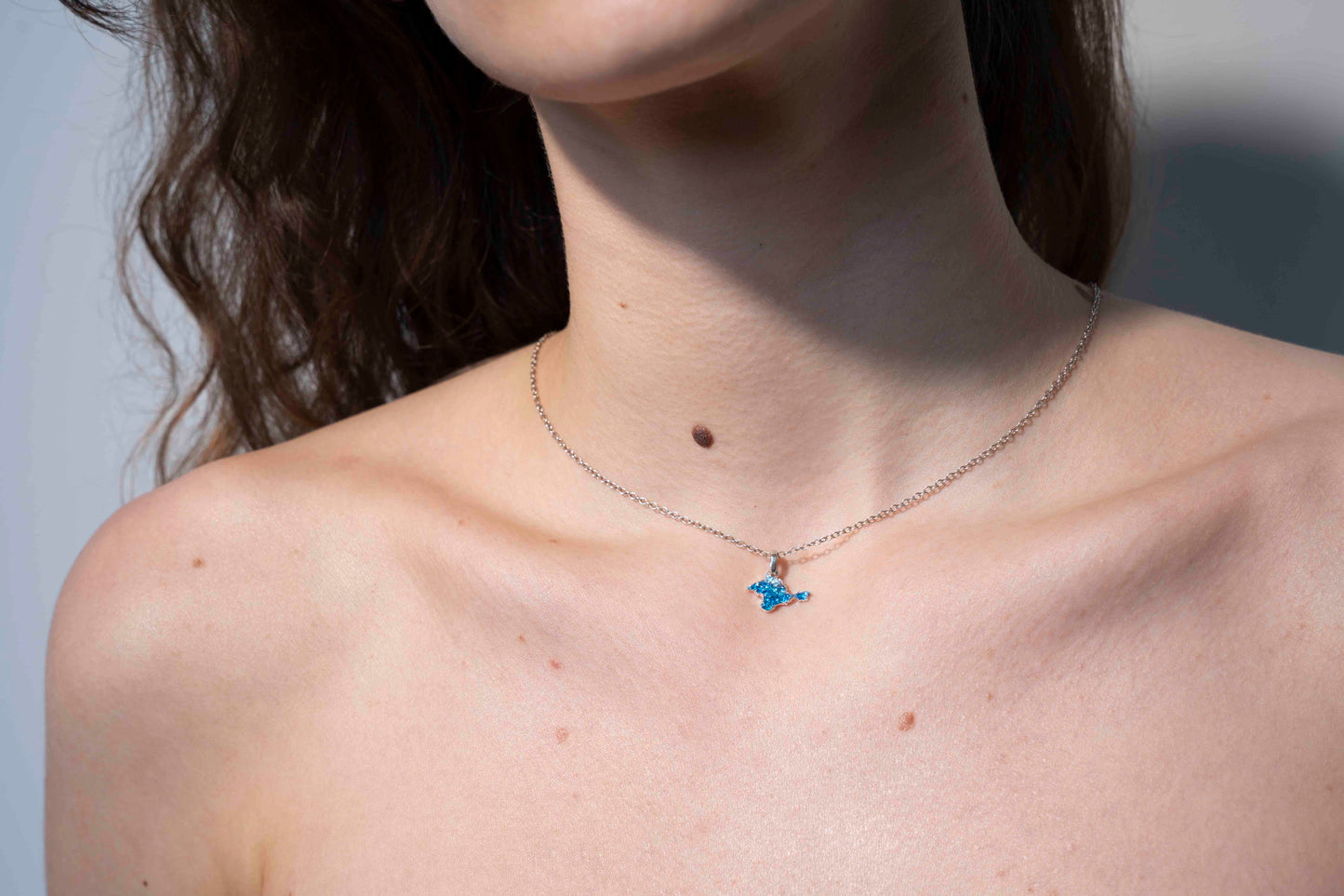 Pendant "Ukrainian Peninsula" textured with blue enamel