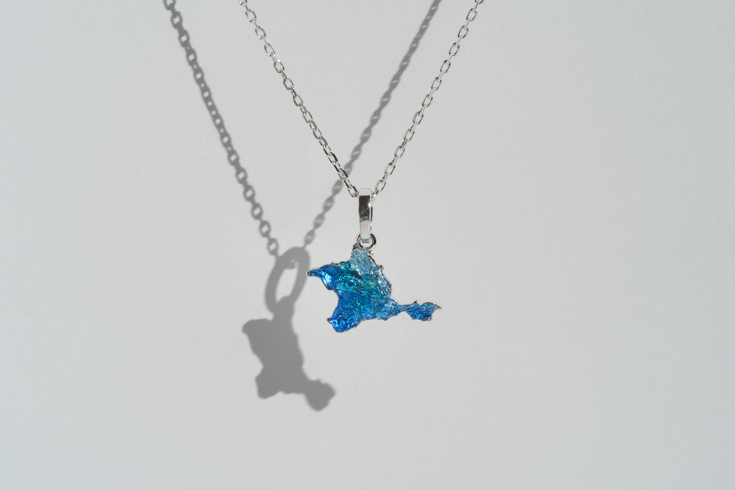 Pendant "Ukrainian Peninsula" textured with blue enamel