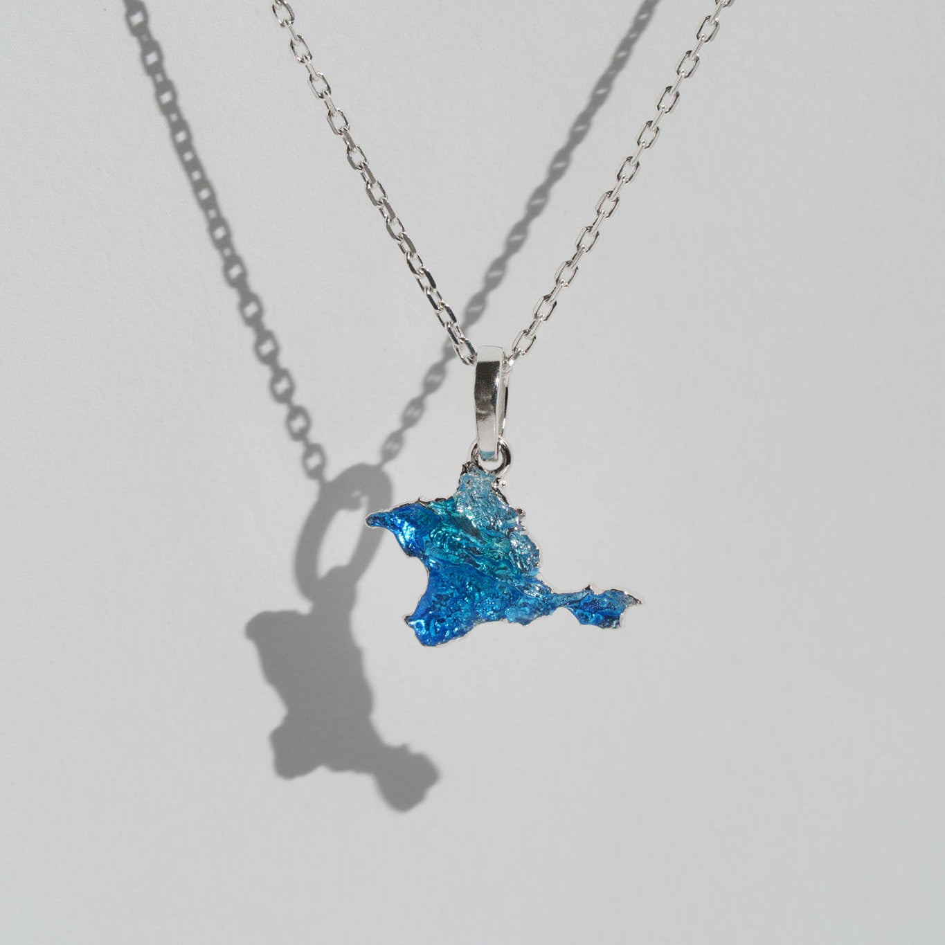 Pendant "Ukrainian Peninsula" textured with blue enamel