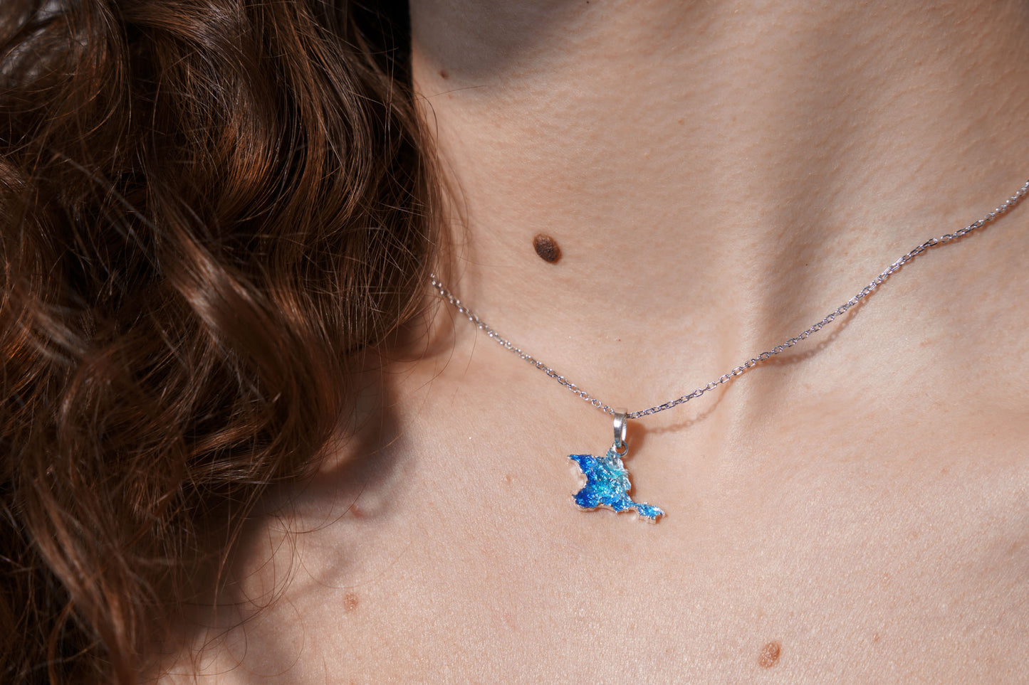 Pendant "Ukrainian Peninsula" textured with blue enamel