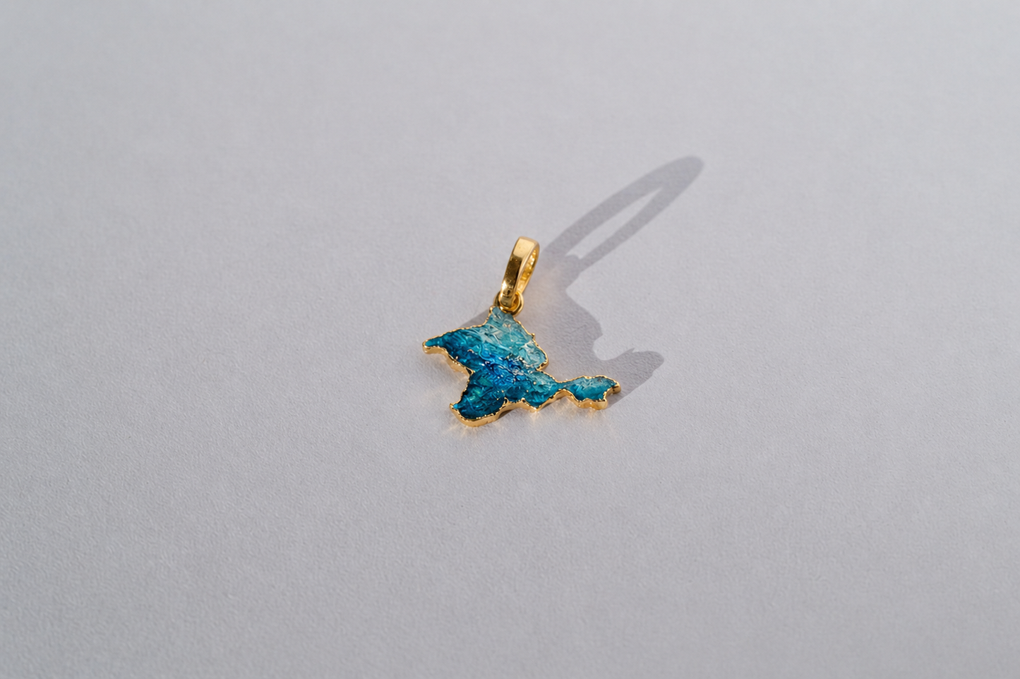 Pendant "Ukrainian Peninsula" textured with emerald enamel