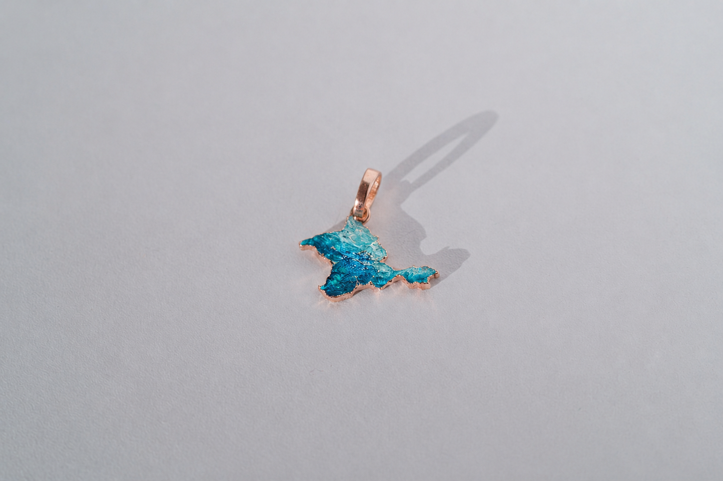 Pendant "Ukrainian Peninsula" textured with emerald enamel