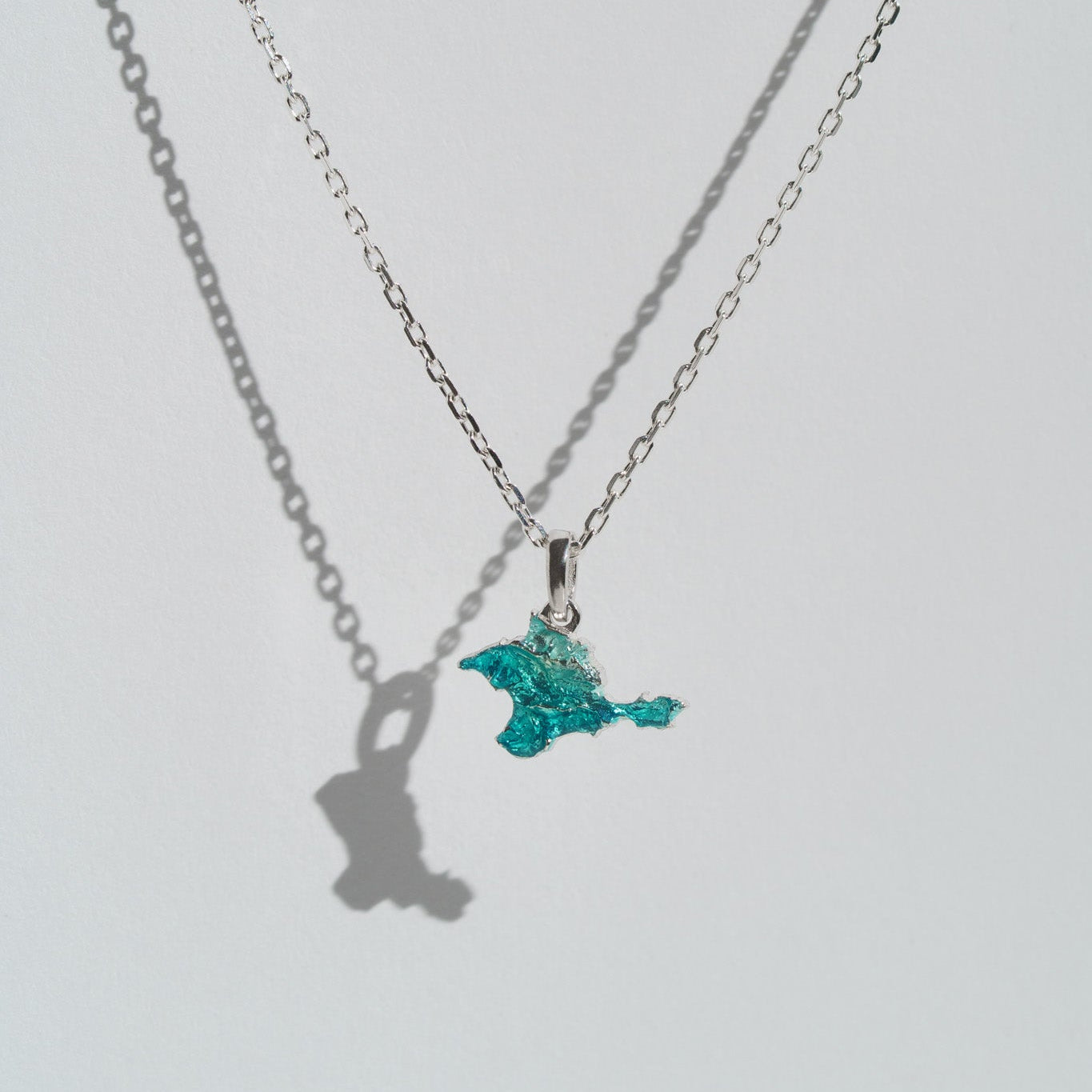 Pendant "Ukrainian Peninsula" textured with emerald enamel