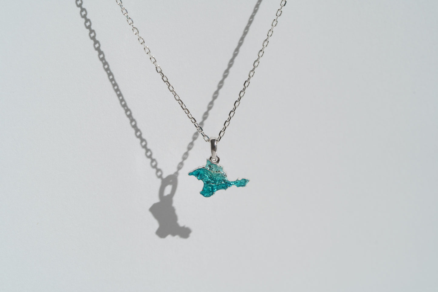 Pendant "Ukrainian Peninsula" textured with emerald enamel