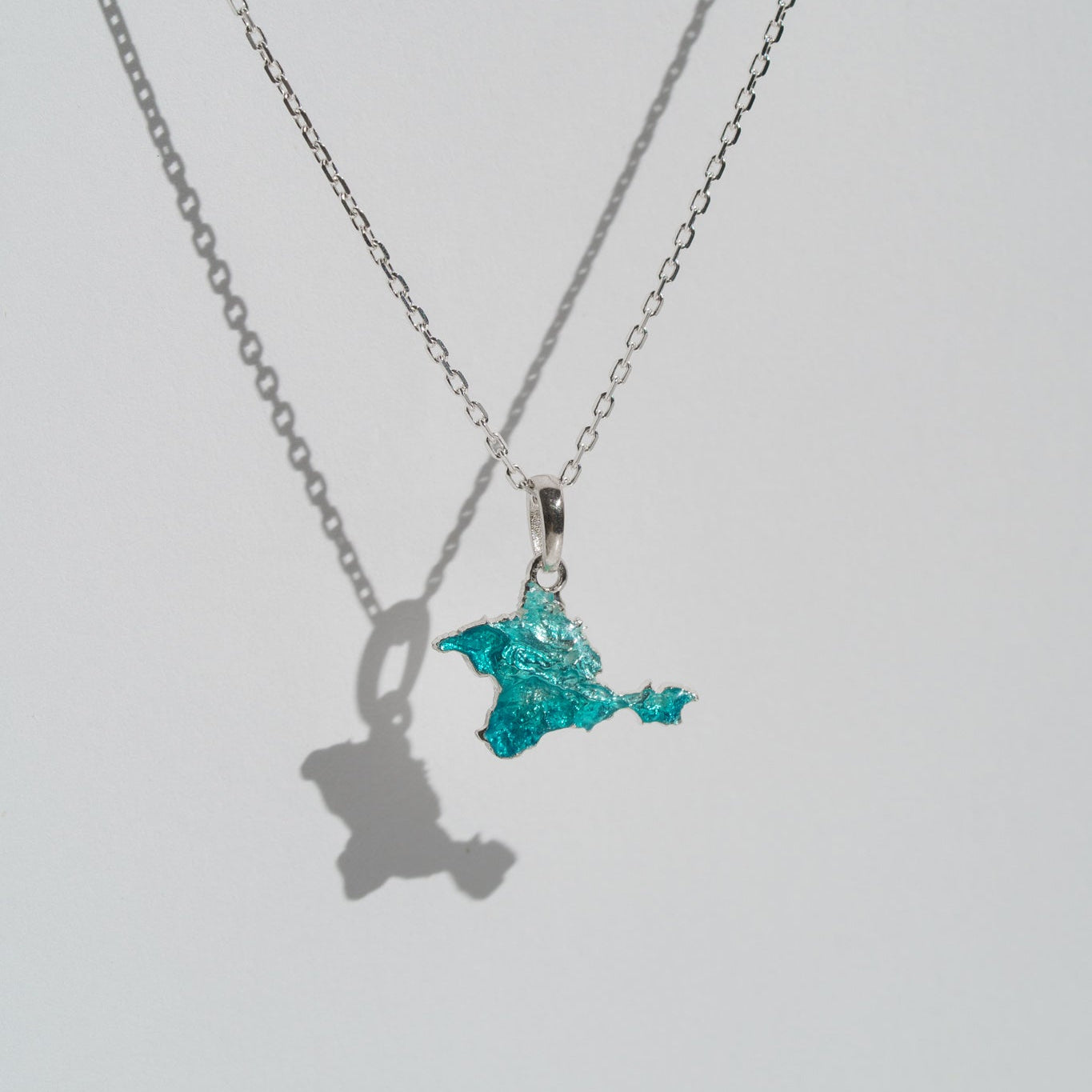 Pendant "Ukrainian Peninsula" textured with emerald enamel