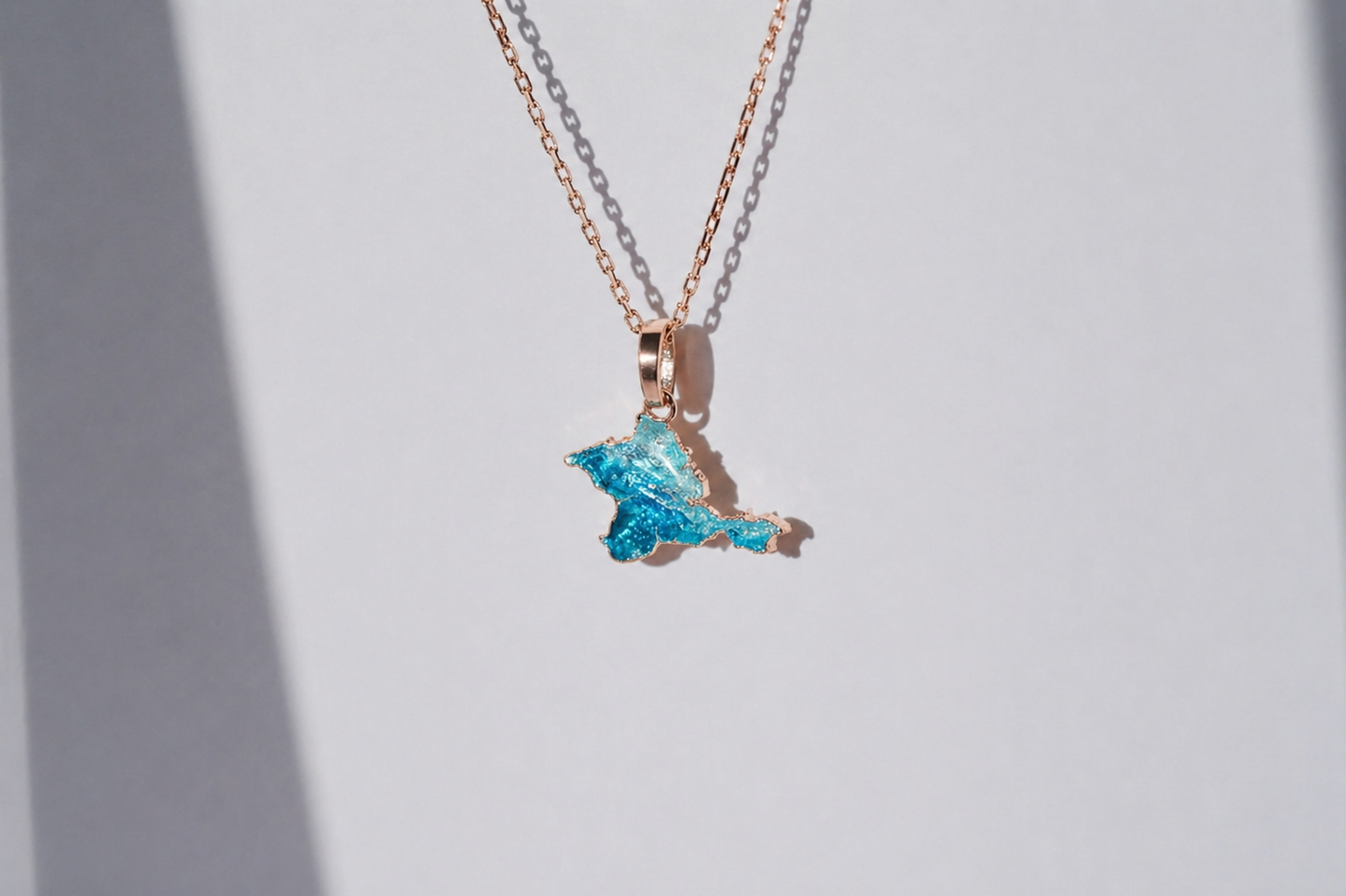 Pendant "Ukrainian Peninsula" textured with emerald enamel