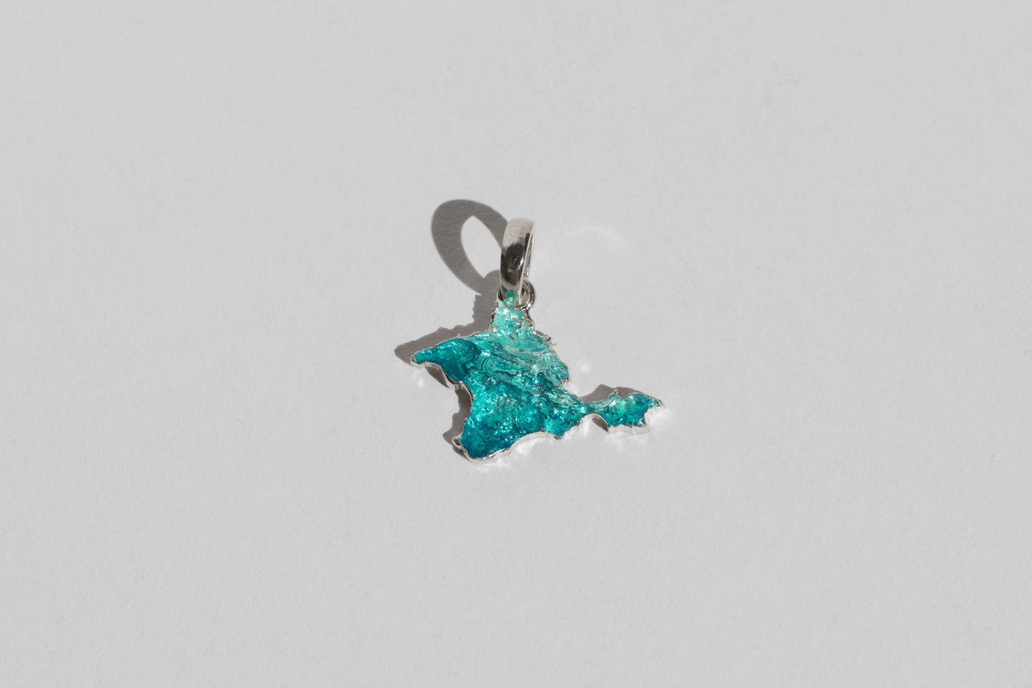 Pendant "Ukrainian Peninsula" textured with emerald enamel