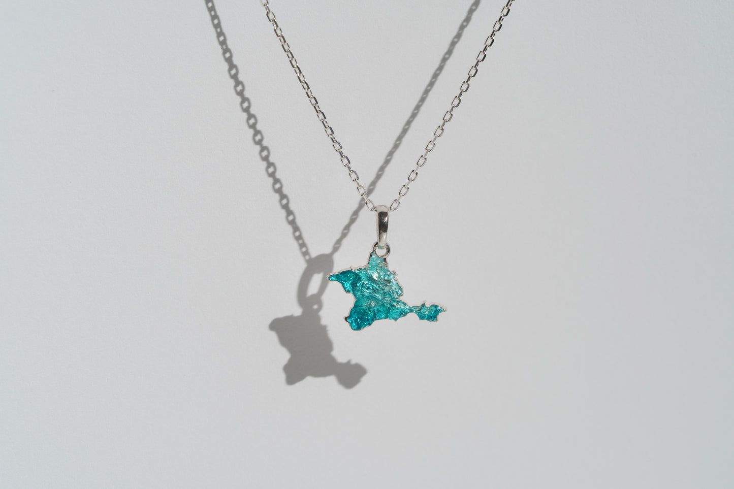 Pendant "Ukrainian Peninsula" textured with emerald enamel