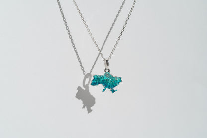Pendant "United" textured with emerald enamel