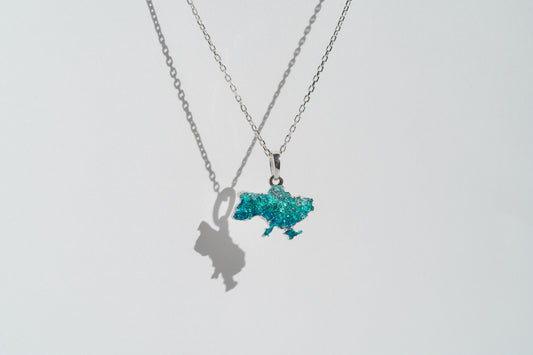 Pendant "United" textured with emerald enamel