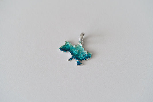 Pendant "United" textured with emerald enamel