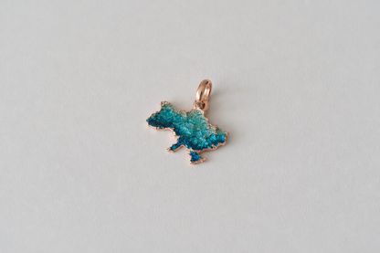 Pendant "United" textured with emerald enamel