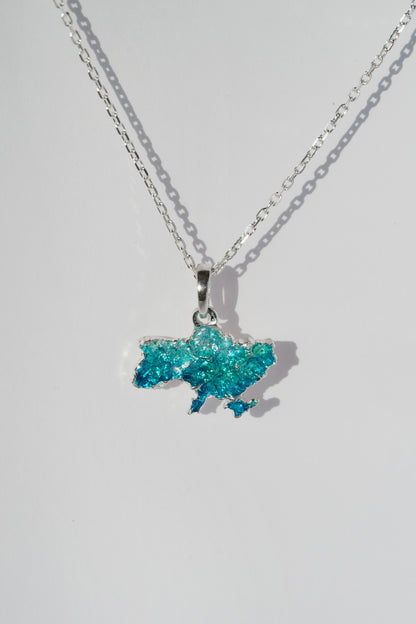 Pendant "United" textured with emerald enamel