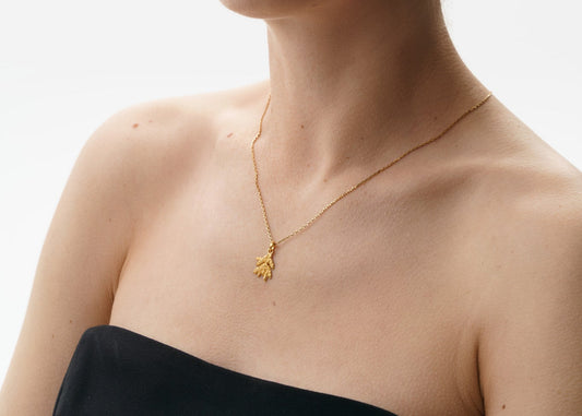 Pendant “Spruce Branch” with gilding