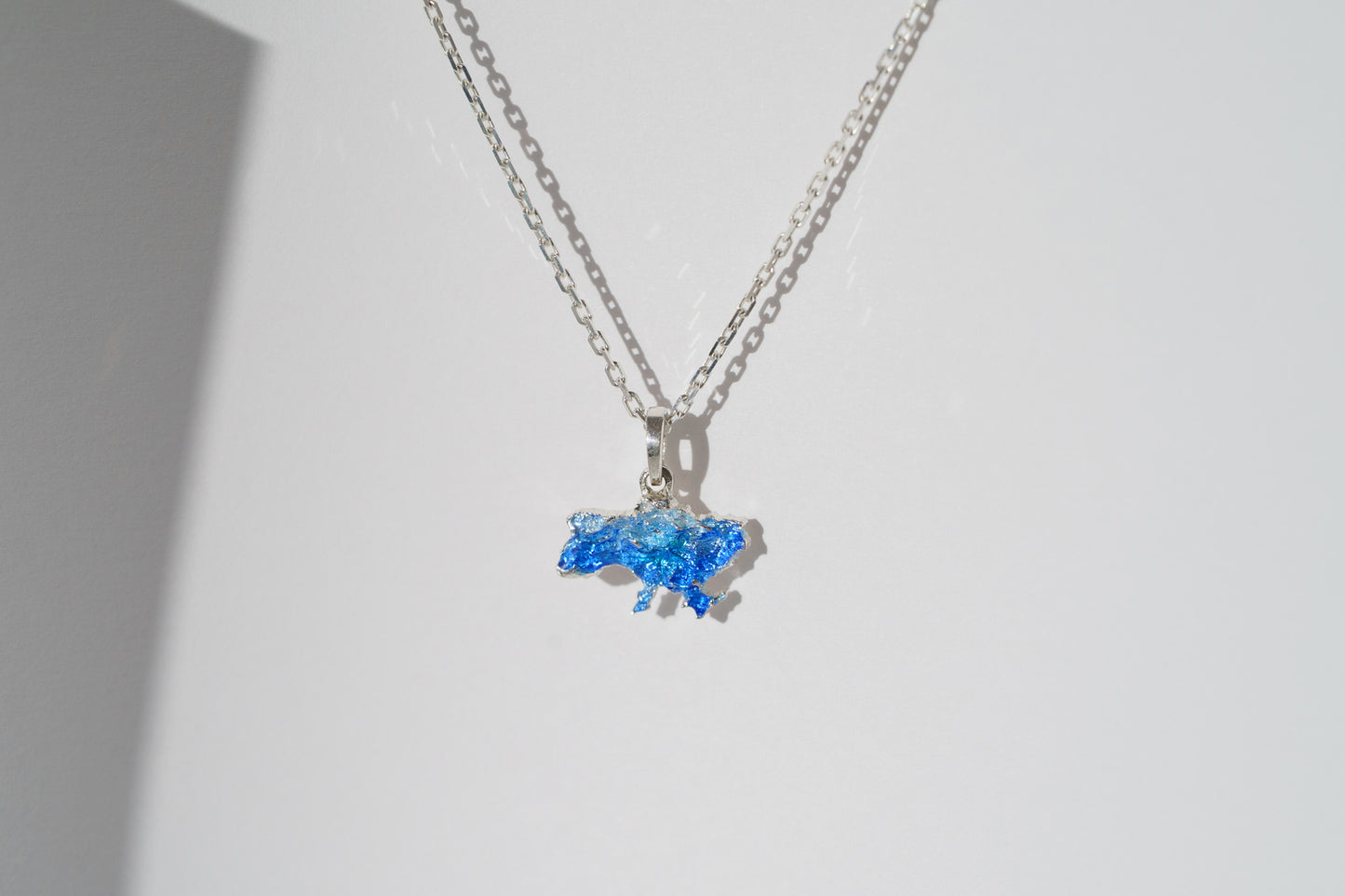 Pendant "United" textured with blue enamel
