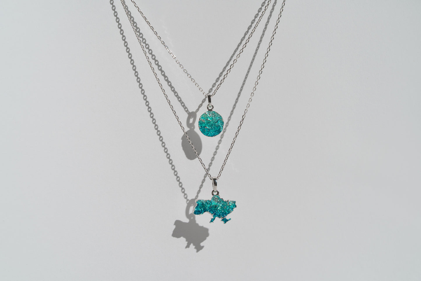 Pendant-disc "Wave" (10 mm) emerald