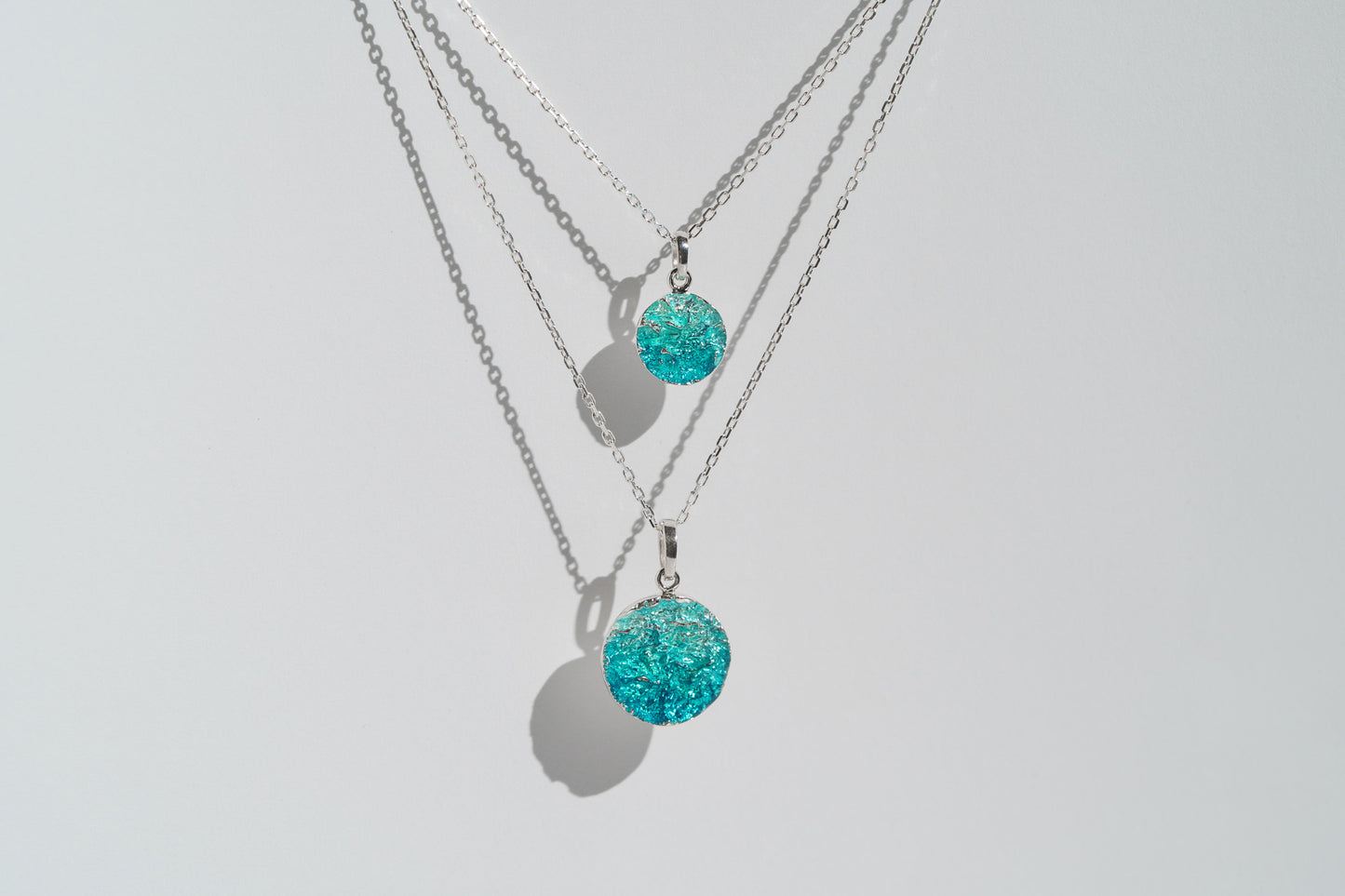 Pendant-disc "Wave" (10 mm) emerald