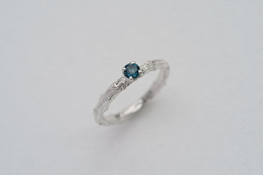 Ring "Light vine" (with topaz London blue 3,5 mm)