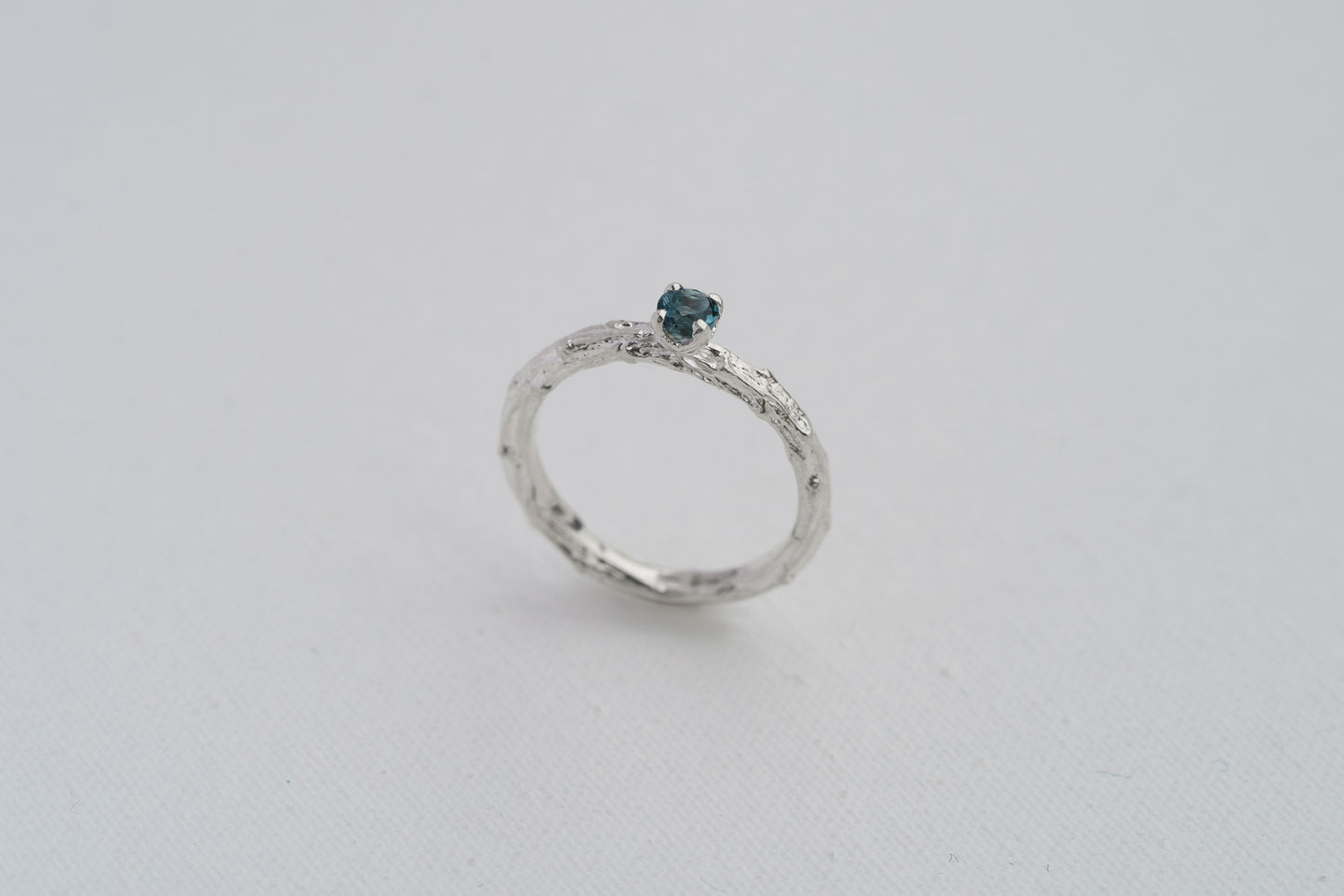 Ring "Light vine" (with topaz London blue 3,5 mm)