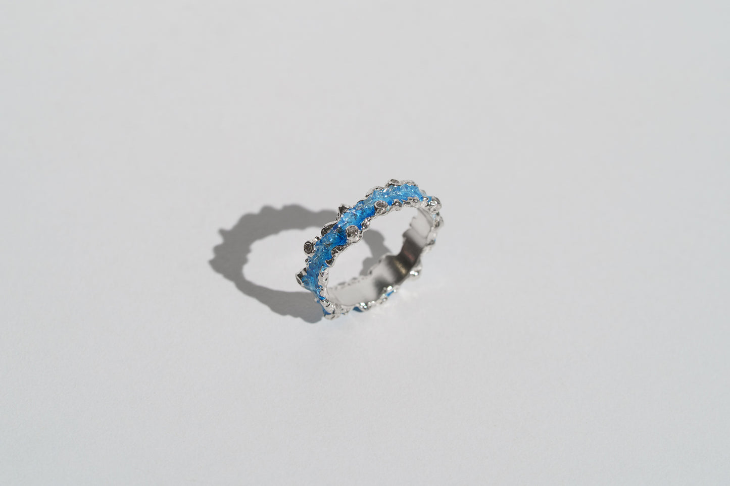 Ring "Wave" (4 mm) blue with cubic zirconia